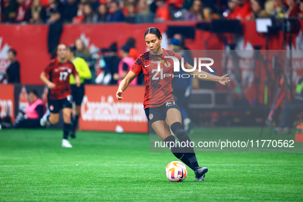 J. Rose #21 carries the ball during the International Friendly Match between Canada and Australia at BC Place in Vancouver, Canada, on Decem...