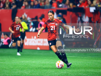 J. Rose #21 carries the ball during the International Friendly Match between Canada and Australia at BC Place in Vancouver, Canada, on Decem...