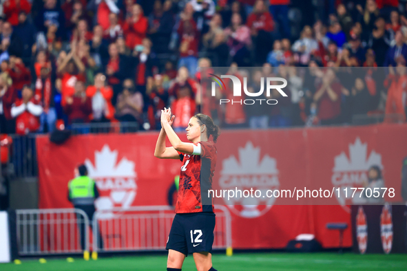 In Vancouver, Canada, on December 5, 2023, C. Sinclair #12 receives applause as she retires from international duty during the International...