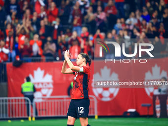 In Vancouver, Canada, on December 5, 2023, C. Sinclair #12 receives applause as she retires from international duty during the International...