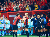 In Vancouver, Canada, on December 5, 2023, C. Sinclair, #12, passes the captain armband to S. Schmidt during the International Friendly Matc...