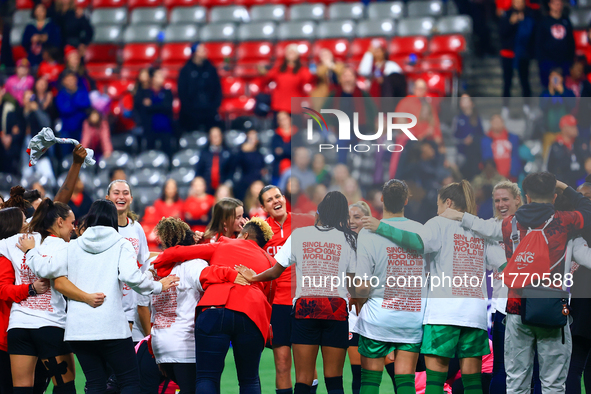 Team Canada's players celebrate the retirements of S. Schmidt and C. Sinclair during the International Friendly Match between Canada and Aus...