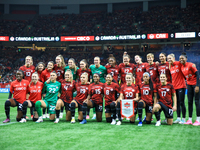 Team Canada's players line up during the International Friendly Match between Canada and Australia at BC Place in Vancouver, Canada, on Dece...