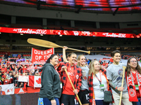 In Vancouver, Canada, on December 5, 2023, Sophie Schmidt, Christine Sinclair, and Erin McLeod take photos with fans during the Internationa...