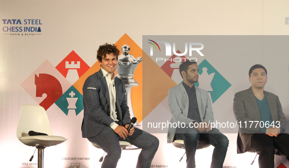 Norway's Magnus Carlsen looks on along with other players during the 6th Tata Steel Chess India Rapid & Blitz in Kolkata, India, on November...