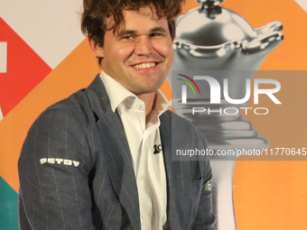 Norway's Magnus Carlsen smiles during the 6th Tata Steel Chess India Rapid & Blitz in Kolkata, India, on November 12, 2024. Sven Magnus Carl...