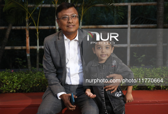 Dibyendu Barua, an Indian chess grandmaster and three-time Indian Chess Champion, poses with India's Anish Sarkar, the world's youngest ches...