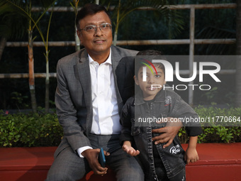 Dibyendu Barua, an Indian chess grandmaster and three-time Indian Chess Champion, poses with India's Anish Sarkar, the world's youngest ches...