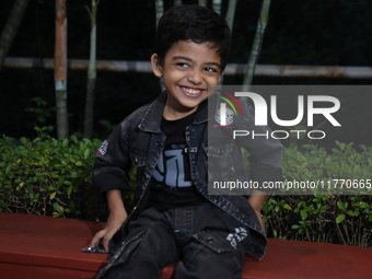 The world's youngest chess player, India's Anish Sarkar, smiles during the 6th Tata Steel Chess India Rapid & Blitz in Kolkata, India, on No...