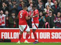 Murillo of Nottingham Forest celebrates with Anthony Elanga of Nottingham Forest after scoring a goal during the Premier League match betwee...