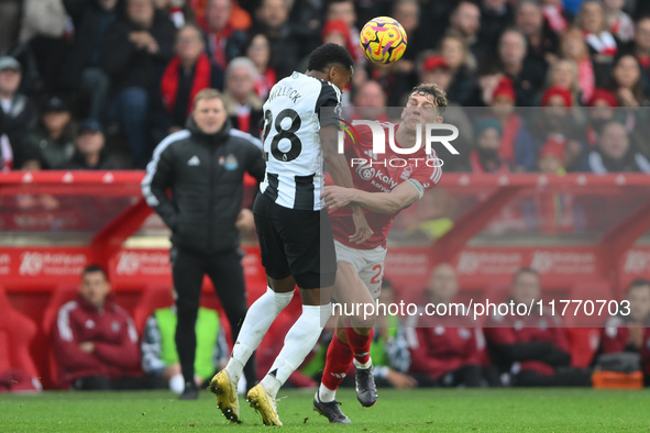 Ryan Yates of Nottingham Forest battles with Joe Willock of Newcastle United during the Premier League match between Nottingham Forest and N...