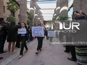 Judicial Branch workers participate in a ceremony to bid farewell to judges and magistrates who resign from voting to keep their posts at th...