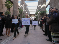 Judicial Branch workers participate in a ceremony to bid farewell to judges and magistrates who resign from voting to keep their posts at th...