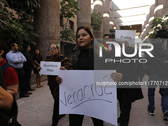 Judicial Branch workers participate in a ceremony to bid farewell to judges and magistrates who resign from voting to keep their posts at th...