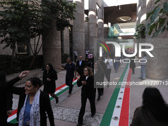 Judicial Branch workers participate in a ceremony to bid farewell to judges and magistrates who resign from voting to keep their posts at th...