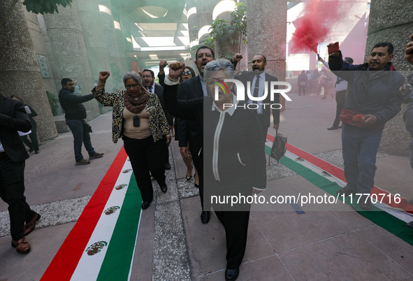 Judicial Branch workers participate in a ceremony to bid farewell to judges and magistrates who resign from voting to keep their posts at th...