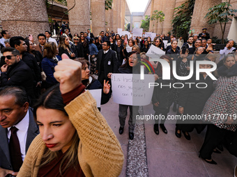 Judicial Branch workers participate in a ceremony to bid farewell to judges and magistrates who resign from voting to keep their posts at th...