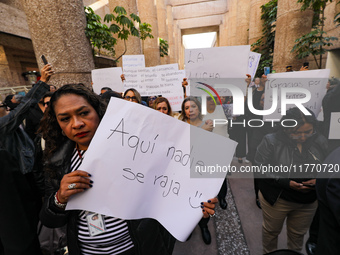 Judicial Branch workers participate in a ceremony to bid farewell to judges and magistrates who resign from voting to keep their posts at th...