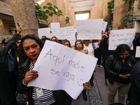 Judicial Branch workers participate in a ceremony to bid farewell to judges and magistrates who resign from voting to keep their posts at th...