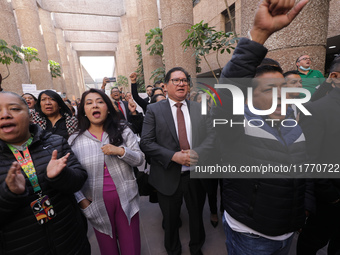 Judicial Branch workers participate in a ceremony to bid farewell to judges and magistrates who resign from voting to keep their posts at th...