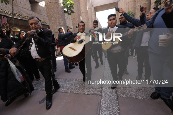 Judicial Branch workers participate in a ceremony to bid farewell to judges and magistrates who resign from voting to keep their posts at th...