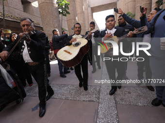 Judicial Branch workers participate in a ceremony to bid farewell to judges and magistrates who resign from voting to keep their posts at th...