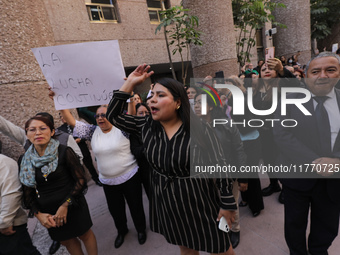 Judicial Branch workers participate in a ceremony to bid farewell to judges and magistrates who resign from voting to keep their posts at th...