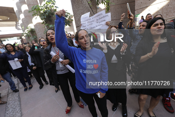 Judicial Branch workers participate in a ceremony to bid farewell to judges and magistrates who resign from voting to keep their posts at th...