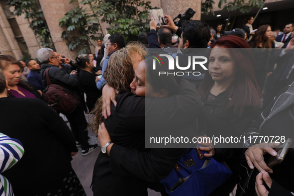 Judicial Branch workers participate in a ceremony to bid farewell to judges and magistrates who resign from voting to keep their posts at th...