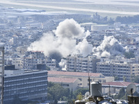 Smoke rises from the site of an Israeli airstrike that targets a neighborhood in Beirut's southern suburbs on November 12, 2024. (