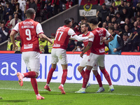 Ricardo Horta of SC Braga celebrates with his teammates after scoring his team's first goal during the Liga Portugal Betclic match between S...