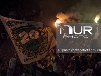 Fans of Sporting CP light flares in the stand during the Liga Portugal Betclic match between SC Braga and Sporting CP at Estadio Municipal d...