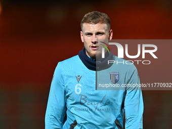 Ethan Coleman (6 Gillingham) warms up during the EFL Trophy match between Stevenage and Gillingham at the Lamex Stadium in Stevenage, Englan...