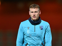 Ethan Coleman (6 Gillingham) warms up during the EFL Trophy match between Stevenage and Gillingham at the Lamex Stadium in Stevenage, Englan...