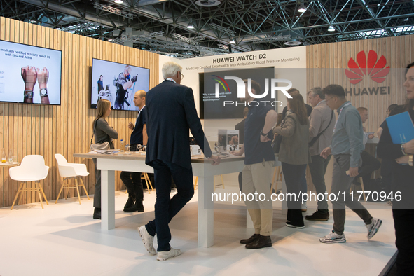 Fairgoers are seen at the Huawei booth at Medica 2024 at the Duesseldorf exhibition center in Duesseldorf, Germany, on November 12, 2024. 