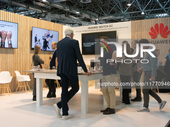 Fairgoers are seen at the Huawei booth at Medica 2024 at the Duesseldorf exhibition center in Duesseldorf, Germany, on November 12, 2024. (