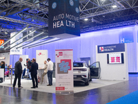 Fairgoers are seen at the Auto Health booth at Medica 2024 at the Duesseldorf exhibition center in Duesseldorf, Germany, on November 12, 202...