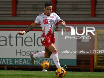 Elliot List (17 Stevenage) controls the ball during the EFL Trophy match between Stevenage and Gillingham at the Lamex Stadium in Stevenage,...