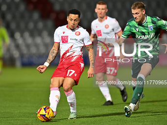 Elliot List (17 Stevenage) is challenged by Ethan Coleman (6 Gillingham) during the EFL Trophy match between Stevenage and Gillingham at the...