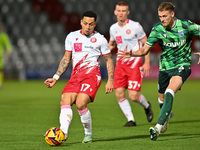 Elliot List (17 Stevenage) is challenged by Ethan Coleman (6 Gillingham) during the EFL Trophy match between Stevenage and Gillingham at the...