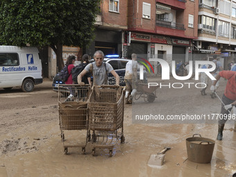 Scenes of devastation in the streets of Benetusser after the passing of the flood, army, firefighters, police and volunteers help to normali...