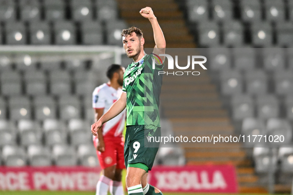 Josh Andrews (9 Gillingham) celebrates after scoring the team's first goal, making it 0-1, during the EFL Trophy match between Stevenage and...