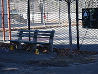 Evidence markers indicate where blood and other evidence is found after a 21-year-old man is fatally stabbed at Steuben Park in Brooklyn, Ne...