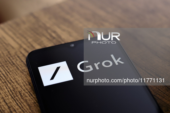 The Grok logo appears on the screen of a smartphone in Reno, United States, on November 12, 2024. Grok is a generative artificial intelligen...