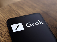 The Grok logo appears on the screen of a smartphone in Reno, United States, on November 12, 2024. Grok is a generative artificial intelligen...