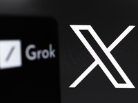 The Grok logo appears on the screen of a smartphone, and in the background, the logo of the social network X (formerly Twitter) is on the co...