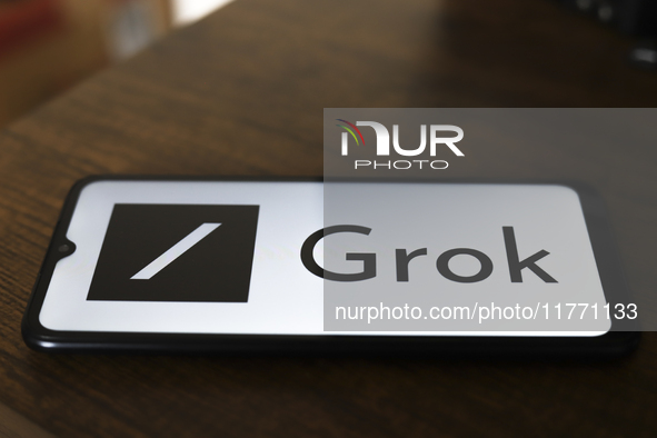 The Grok logo appears on the screen of a smartphone in Reno, United States, on November 12, 2024. Grok is a generative artificial intelligen...