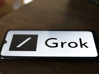 The Grok logo appears on the screen of a smartphone in Reno, United States, on November 12, 2024. Grok is a generative artificial intelligen...