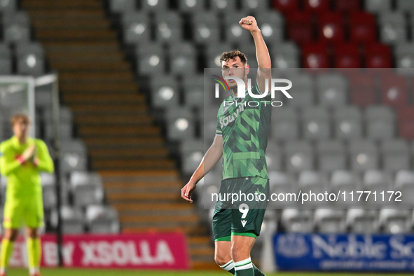 Josh Andrews (9 Gillingham) gestures to fans after scoring the opening goal during the EFL Trophy match between Stevenage and Gillingham at...