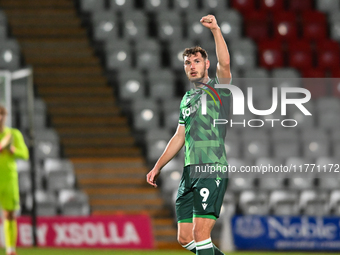 Josh Andrews (9 Gillingham) gestures to fans after scoring the opening goal during the EFL Trophy match between Stevenage and Gillingham at...